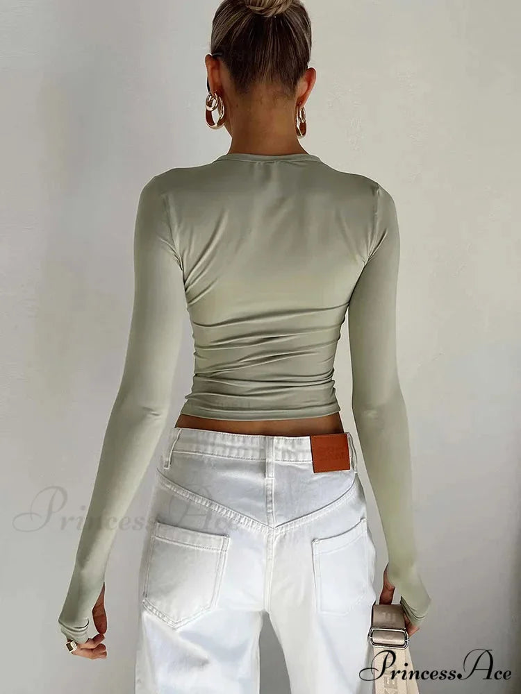 Stylish Crew Neck Trim Fit Extended Sleeve Knit Top with Thumb Holes