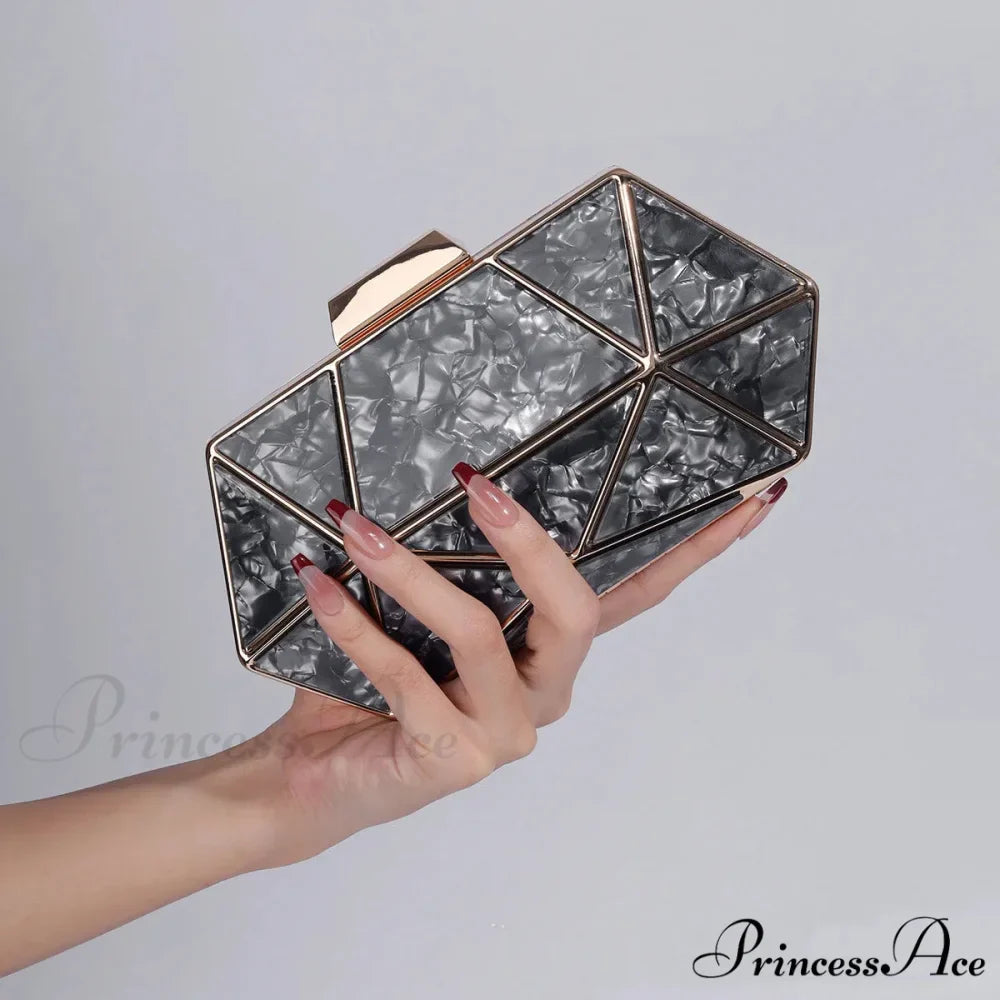 Synonyms for the adjectives in the title:- Acrylic: transparent- Metal: metallic- Diamond: gemstone- Evening: nighttimeModified title: Transparent Metallic Gemstone Nighttime Clutch Crossbody Bag