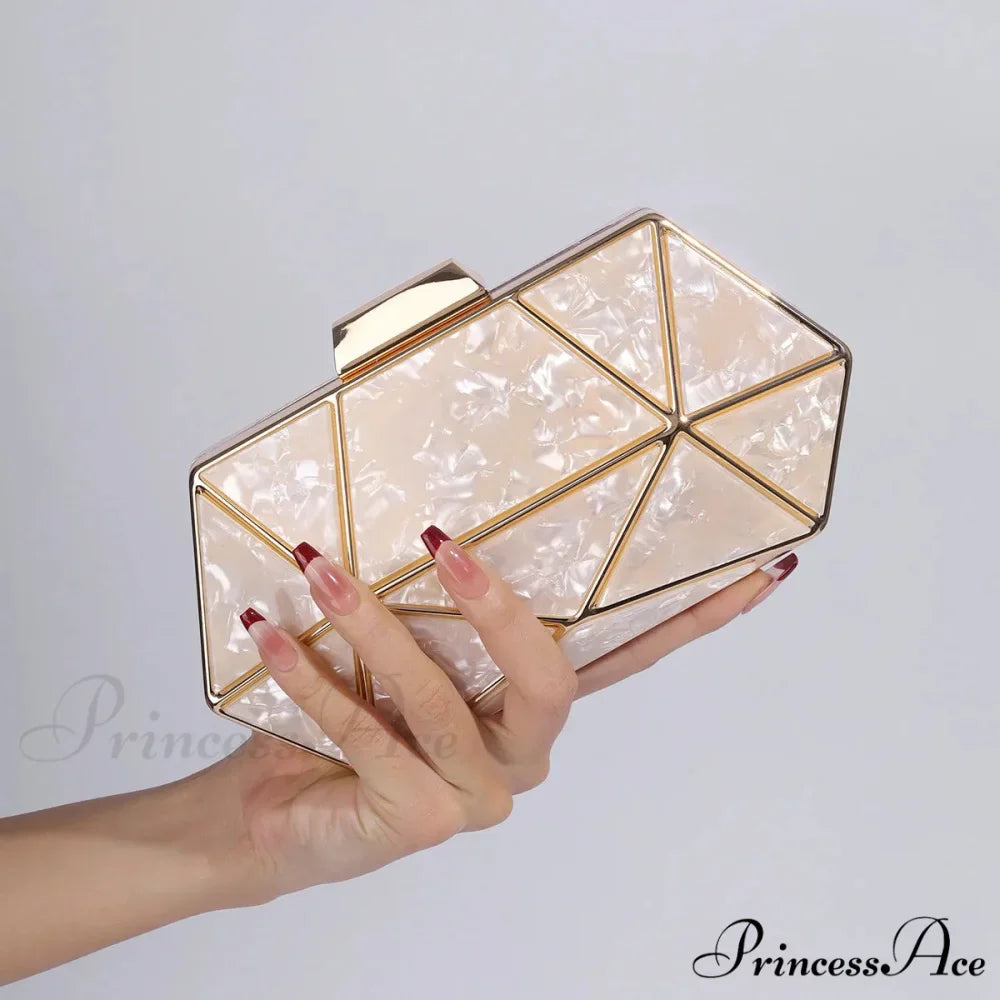 Synonyms for the adjectives in the title:- Acrylic: transparent- Metal: metallic- Diamond: gemstone- Evening: nighttimeModified title: Transparent Metallic Gemstone Nighttime Clutch Crossbody Bag