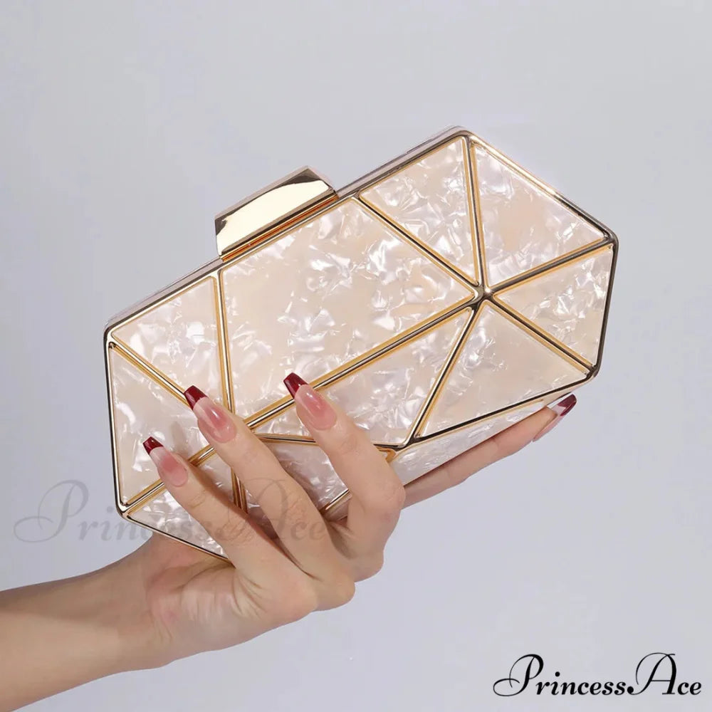 Synonyms for the adjectives in the title:- Acrylic: transparent- Metal: metallic- Diamond: gemstone- Evening: nighttimeModified title: Transparent Metallic Gemstone Nighttime Clutch Crossbody Bag