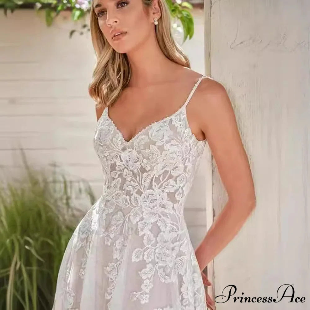 Thin Strap Transparent Train Wedding Gown