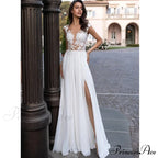 V-Neck Extended Sleeve Open-Back Bridal Gown