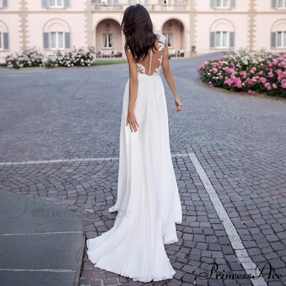 V-Neck Extended Sleeve Open-Back Bridal Gown