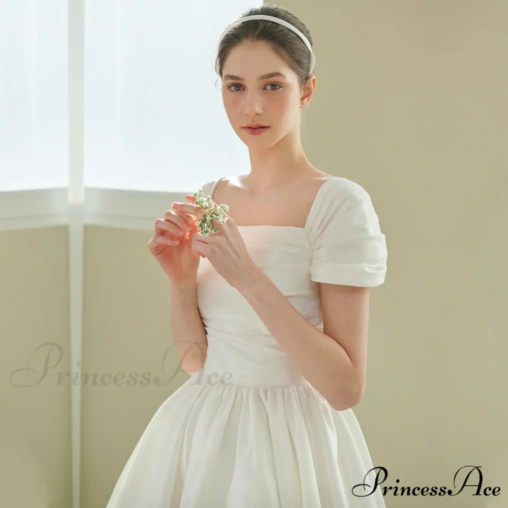 Vintage Wedding Gown with Off-the-Shoulder Design